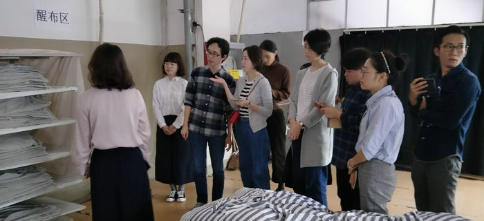 bmw11222服装接待无印良品公司员工参观考察学习
