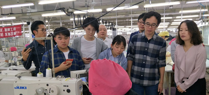 bmw11222服装接待无印良品公司员工参观考察学习
